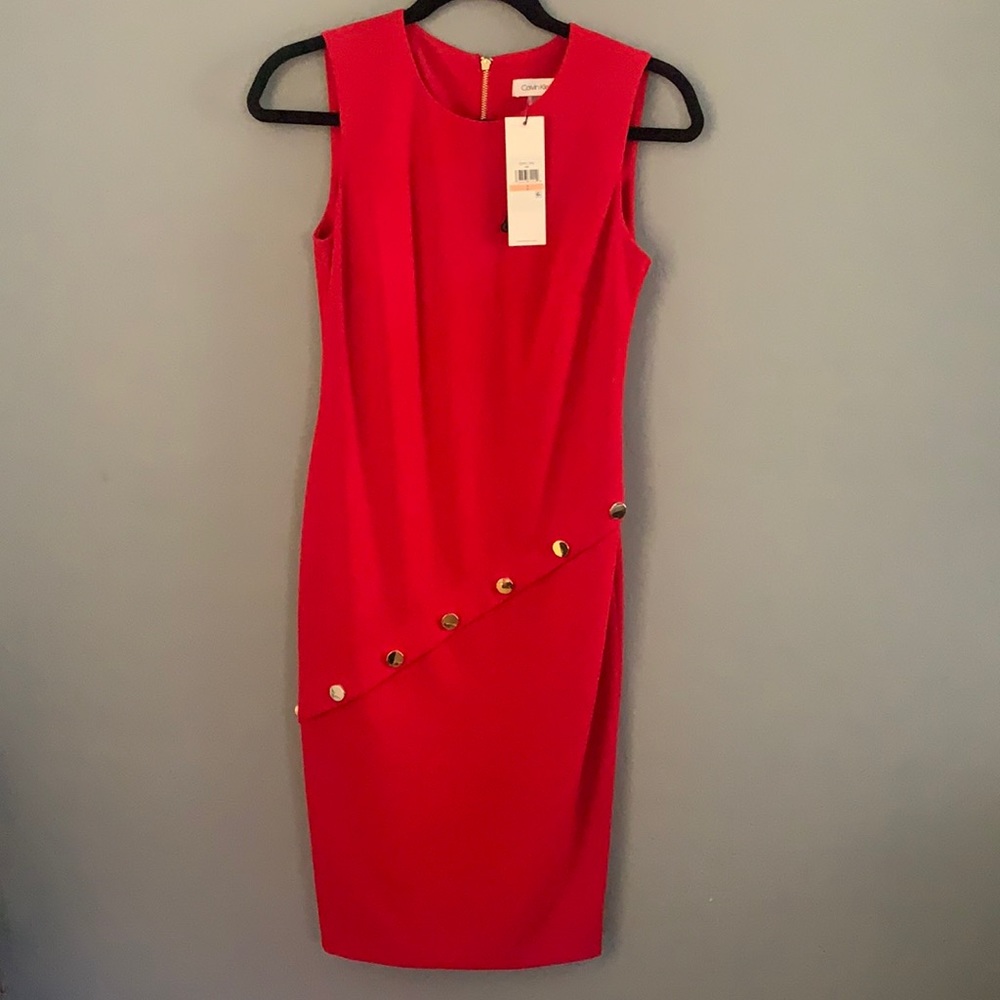 Red midi dress with gold buttons and gold zipper back